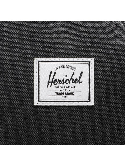 Herschel Nova Backpack in Black, 18L, side angle view — BambiniJO Jordan