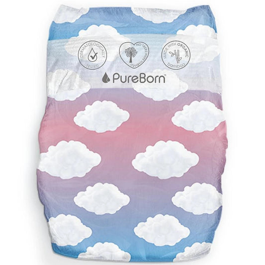 A baby diaper with a sky and cloud pattern, featuring a blue and pink gradient background with white clouds. The brand name 'PureBorn' is printed on the front along with three circular certification logos at the top.