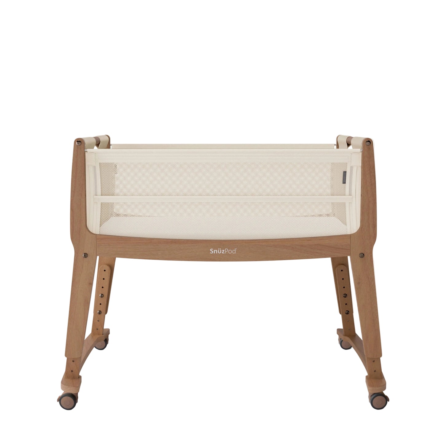 Baby crib with white mattress and wooden frame on a white background