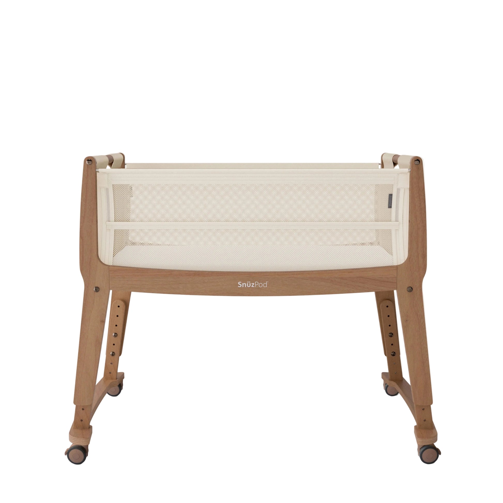 Baby crib with white mattress and wooden frame on a white background