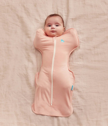 لاف تو دريم - كيس نوم للأطفال - Swaddle UP™  قابل للتمدد | 0.2 توغ | وردي فاتح | صغير