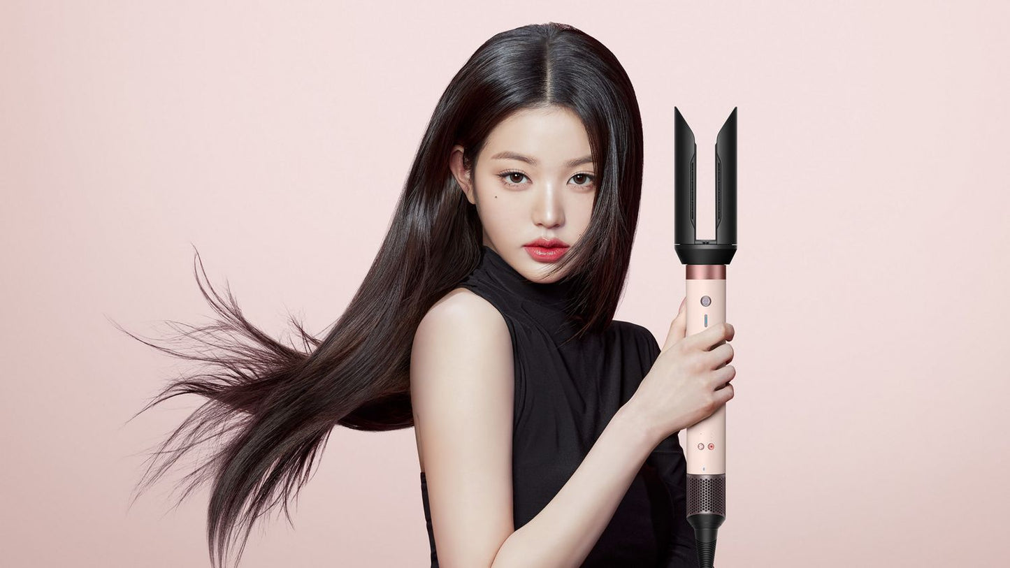 Model styling hair with Dyson Airwrap Co-anda2x — BambiniJO Jordan