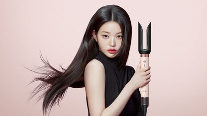Model styling hair with Dyson Airwrap Co-anda2x — BambiniJO Jordan