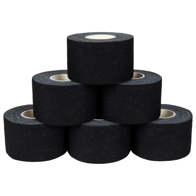 Six rolls of Kintex black cotton sports tape stacked