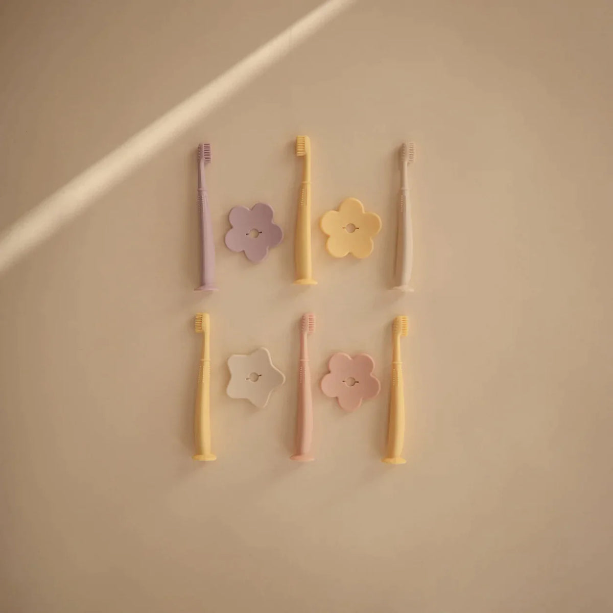 MUSHIE - Silicone Flower Training Toothbrush - Pale Daffadil MUSHIE - Silicone Flower Training Toothbrush - Pale Daffadil